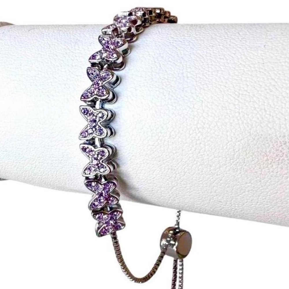 NWT Brilliance genuine crystal purple/pink butterfly bracelet.